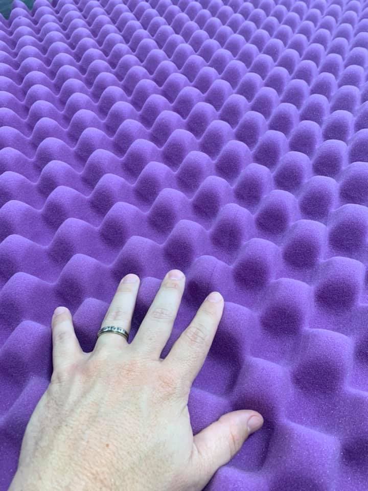 Close-up of convoluted egg-crate foam showing precision peaks