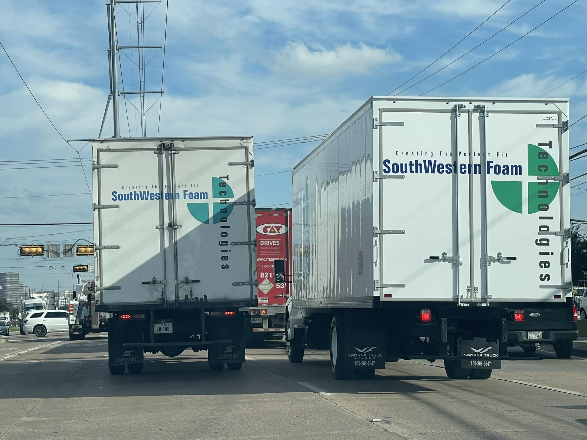 SouthWestern Foam Technologies delivery trucks with Creating The Perfect Fit branding